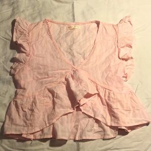 Ruffled shoulder blouse